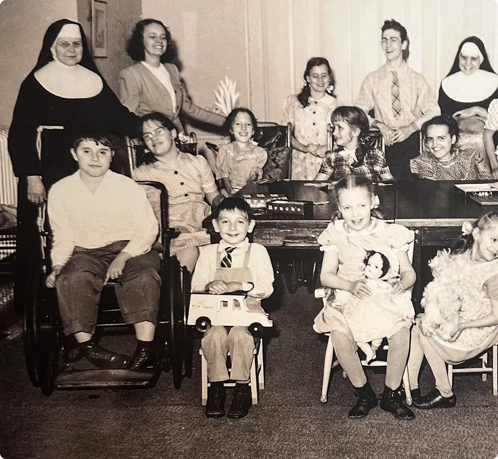 Archival photo of Sisters and children together