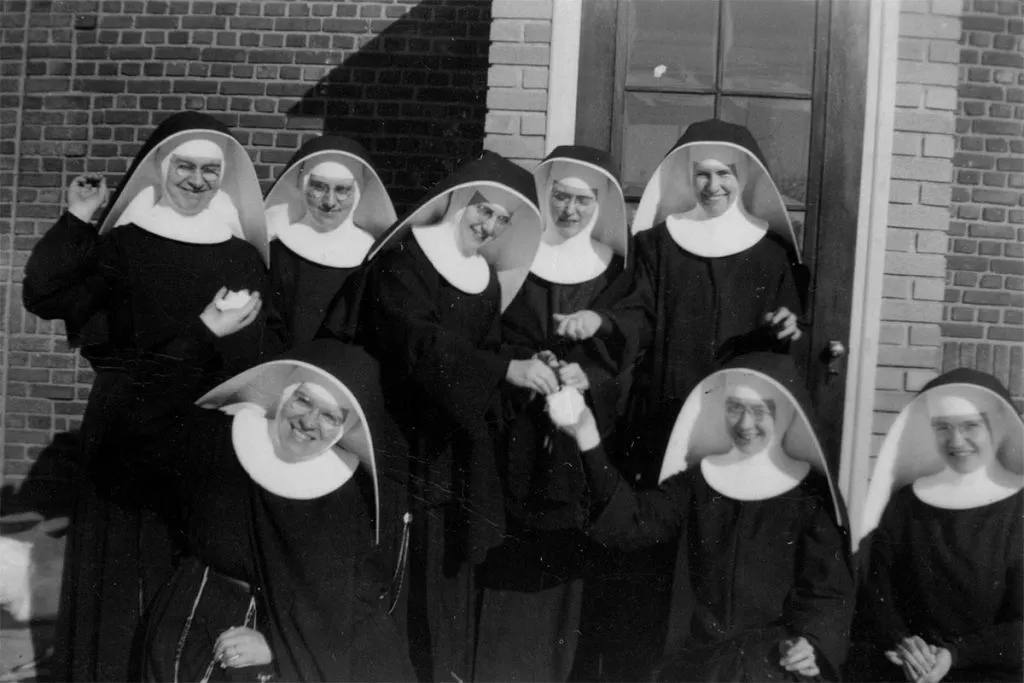 Archival photograph of seven Sisters posing together